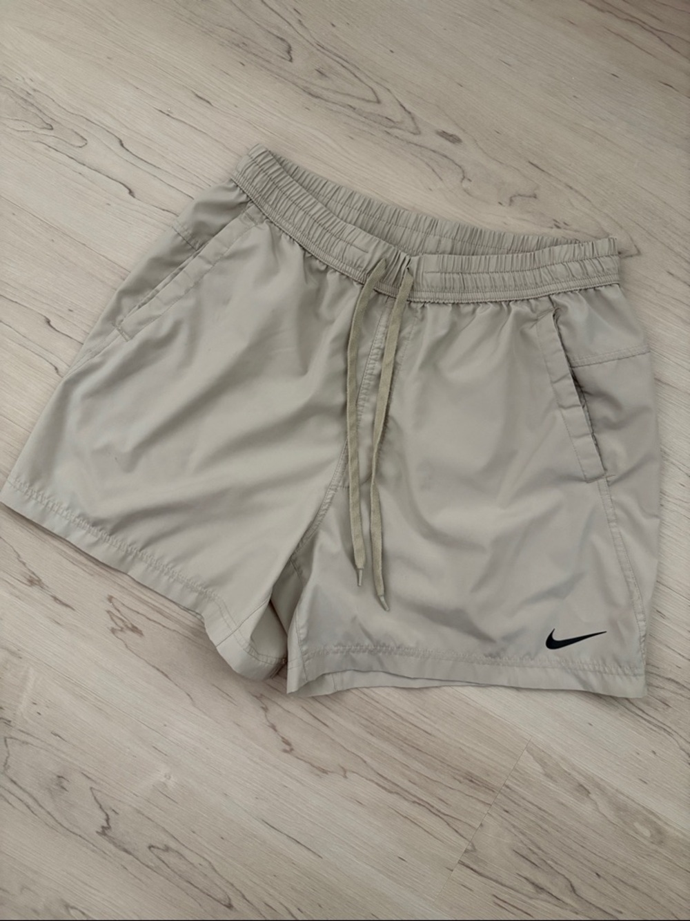 Nike Dri Fit Light Tan Running Shorts with Black Swoosh